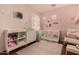 Sweet Bedroom with a crib and charming decor at 2324 W Melody Dr, Phoenix, AZ 85041