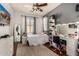Stylish bedroom featuring a vanity, modern decor, and a window at 2324 W Melody Dr, Phoenix, AZ 85041