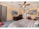 A well-lit bedroom offers a comfortable day bed and stylish furnishings at 2324 W Melody Dr, Phoenix, AZ 85041