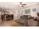 Open-concept living area seamlessly blends the kitchen, dining, and living spaces for easy entertaining at 2324 W Melody Dr, Phoenix, AZ 85041