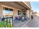 Covered outdoor patio includes a ceiling fan and ample seating at 2324 W Melody Dr, Phoenix, AZ 85041