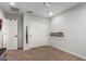 Spare bedroom featuring carpet, and neutral walls providing a blank canvas at 24578 W Concorda Dr, Buckeye, AZ 85326