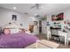Bright bedroom boasts a comfortable bed, white furniture, and decor adding personality at 24578 W Concorda Dr, Buckeye, AZ 85326