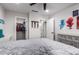 Bedroom featuring a closet, an ensuite, and a comfortable neutral color palette at 24578 W Concorda Dr, Buckeye, AZ 85326