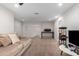 Bonus room featuring plush carpet, neutral walls, ceiling fan and comfortable sectional at 24578 W Concorda Dr, Buckeye, AZ 85326