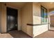 Charming entryway featuring a dark wood door and a welcoming 'Welcome' mat at 24578 W Concorda Dr, Buckeye, AZ 85326