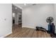 Versatile bonus room with wood-look floors perfect for exercise or recreational activities at 24578 W Concorda Dr, Buckeye, AZ 85326