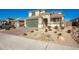 Inviting two-story home with well-kept front yard landscaping and a spacious driveway at 24578 W Concorda Dr, Buckeye, AZ 85326