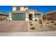 Beautiful two-story home with a well-manicured front yard and a two-car garage at 24578 W Concorda Dr, Buckeye, AZ 85326