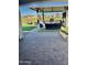 Covered outdoor kitchen featuring a built-in grill and plenty of counter space for entertaining at 24578 W Concorda Dr, Buckeye, AZ 85326