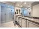 Spacious bathroom with a glass-enclosed shower and a double vanity at 25925 W Mcrae Dr, Buckeye, AZ 85396