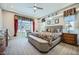 Spacious main bedroom features a tray ceiling, decorative accents, and a sitting area at 25925 W Mcrae Dr, Buckeye, AZ 85396