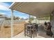 Covered patio featuring yard with seating area, outdoor dining, and neutral colored decor at 2618 N 15Th St, Phoenix, AZ 85006