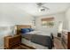 Comfortable bedroom with natural lighting, ceiling fan, and neutral colors at 2618 N 15Th St, Phoenix, AZ 85006