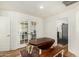 Cozy dining room with a rustic table, benches and light-filled doorway at 2618 N 15Th St, Phoenix, AZ 85006