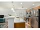 Modern kitchen featuring stainless steel appliances and a breakfast bar at 2618 N 15Th St, Phoenix, AZ 85006