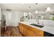 Bright kitchen featuring wood cabinets, quartz countertops, and stylish backsplash at 2618 N 15Th St, Phoenix, AZ 85006