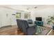 Bright living room featuring hard wood floors, fresh paint, and lots of natural light at 2618 N 15Th St, Phoenix, AZ 85006