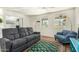 Bright living room with wood floors, fresh paint, and lots of natural light at 2618 N 15Th St, Phoenix, AZ 85006