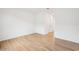 A light-filled bedroom with tile flooring and a pristine, minimalist design at 26361 N 76Th Dr, Peoria, AZ 85383