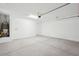 Spacious two-car garage with ample room for parking and storage at 26361 N 76Th Dr, Peoria, AZ 85383