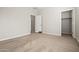 Spacious bedroom with closet, neutral tones, and plush carpeting at 2820 E Tracy Ln # 1, Phoenix, AZ 85032