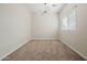 Bright bedroom with carpet flooring and a ceiling fan at 2820 E Tracy Ln # 1, Phoenix, AZ 85032