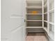 Spacious pantry with multiple shelves for ample storage at 2820 E Tracy Ln # 1, Phoenix, AZ 85032