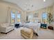 Serene main bedroom with neutral tones, large windows, and elegant decor at 29617 W Eagle Dr, Palo Verde, AZ 85343