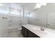 Clean bathroom featuring a bathtub, shower, and long vanity with a white countertop at 36805 W San Clemente St, Maricopa, AZ 85138
