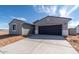 Charming single-Gathering home with a two-car garage and concrete driveway at 36805 W San Clemente St, Maricopa, AZ 85138