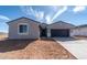 Charming single-Gathering home with a two-car garage and desert landscaping at 36805 W San Clemente St, Maricopa, AZ 85138