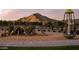 Playground equipment in a community park with mountain views in the distance at 3769 W Antelope Way, San Tan Valley, AZ 85144