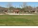 Community park featuring basketball courts and open green spaces at 36805 W San Clemente St, Maricopa, AZ 85138