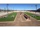 Community horseshoe pits with benches at 36805 W San Clemente St, Maricopa, AZ 85138