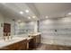 Well-lit bathroom featuring modern sinks with a modern designed shower at 38951 N 101St Way, Scottsdale, AZ 85262