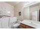 Comfortable bathroom featuring a walk-in tub with safety features and a large vanity at 5450 E Mclellan Rd # 133, Mesa, AZ 85205