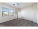 Spacious bedroom with carpet, natural light from windows and a ceiling fan at 5450 E Mclellan Rd # 133, Mesa, AZ 85205