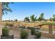 A beautiful golf course view is visible from the landscaped backyard at 5450 E Mclellan Rd # 133, Mesa, AZ 85205