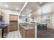 Kitchen featuring stainless appliances, granite counters, and open access to the living space at 5450 E Mclellan Rd # 133, Mesa, AZ 85205