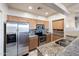 Kitchen with stainless steel appliances, granite countertops, and lots of cabinets at 5450 E Mclellan Rd # 133, Mesa, AZ 85205