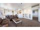 Open-concept living room flowing into the dining area and kitchen, perfect for entertaining at 5450 E Mclellan Rd # 133, Mesa, AZ 85205