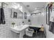 This bathroom includes unique tilework and a freestanding tub at 5916 E Hearn Rd, Scottsdale, AZ 85254