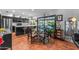 Bright dining area with glass table, stainless appliances, and view to the outside at 5916 E Hearn Rd, Scottsdale, AZ 85254