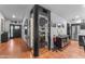 Spacious room featuring a climate-controlled wine room and modern kitchen appliances at 5916 E Hearn Rd, Scottsdale, AZ 85254