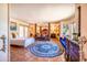 Spacious main bedroom features a sitting area, decorative rug, and exterior views at 7155 E Oakmont Dr, Paradise Valley, AZ 85253