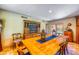 Spacious dining room with hardwood flooring and natural light at 7155 E Oakmont Dr, Paradise Valley, AZ 85253