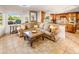 Comfortable living room with tile floors, decorative furniture, and expansive views of the outdoors at 7155 E Oakmont Dr, Paradise Valley, AZ 85253