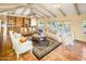 Spacious living room featuring tile floors, ceiling fan, and elegant furnishings at 7155 E Oakmont Dr, Paradise Valley, AZ 85253