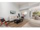 Cozy living room with vaulted ceilings, neutral paint, and lots of natural light at 9175 N 107Th Way, Scottsdale, AZ 85258